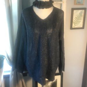New without tags: EASEL Cut out ruffle neck sweater.